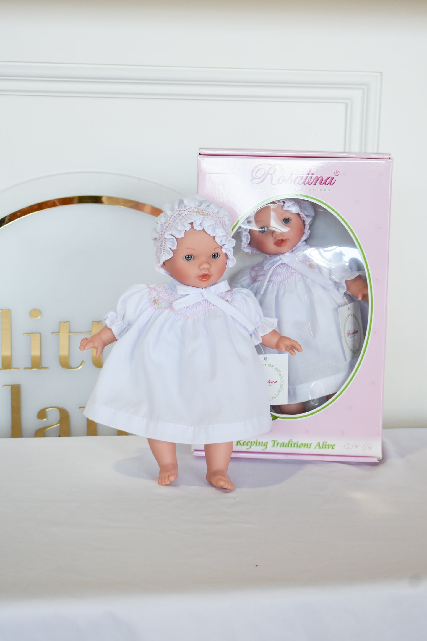 Abby Bald w/ Bonnet Doll-White Smocked Dress