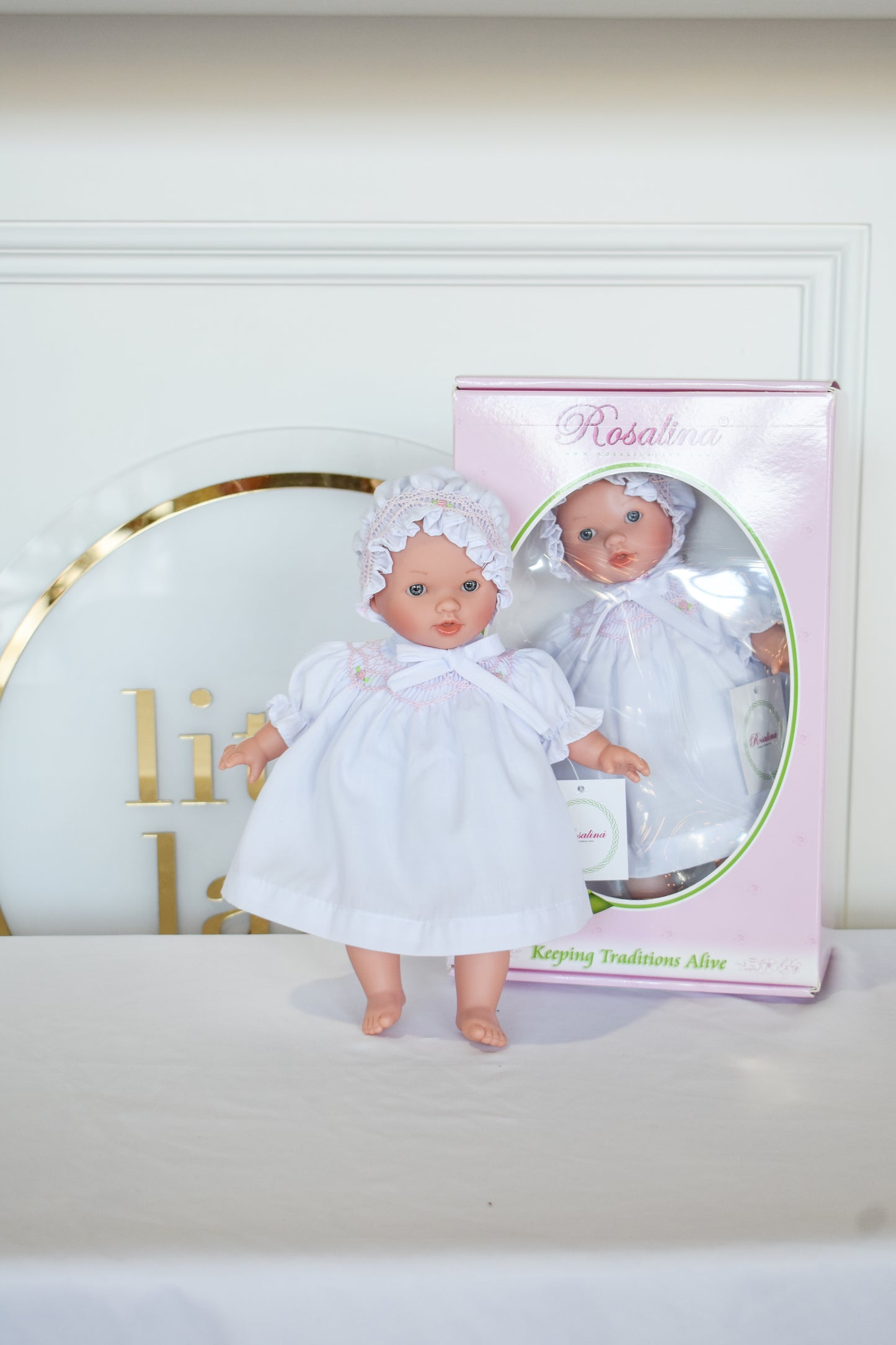 Abby Bald w/ Bonnet Doll-White Smocked Dress