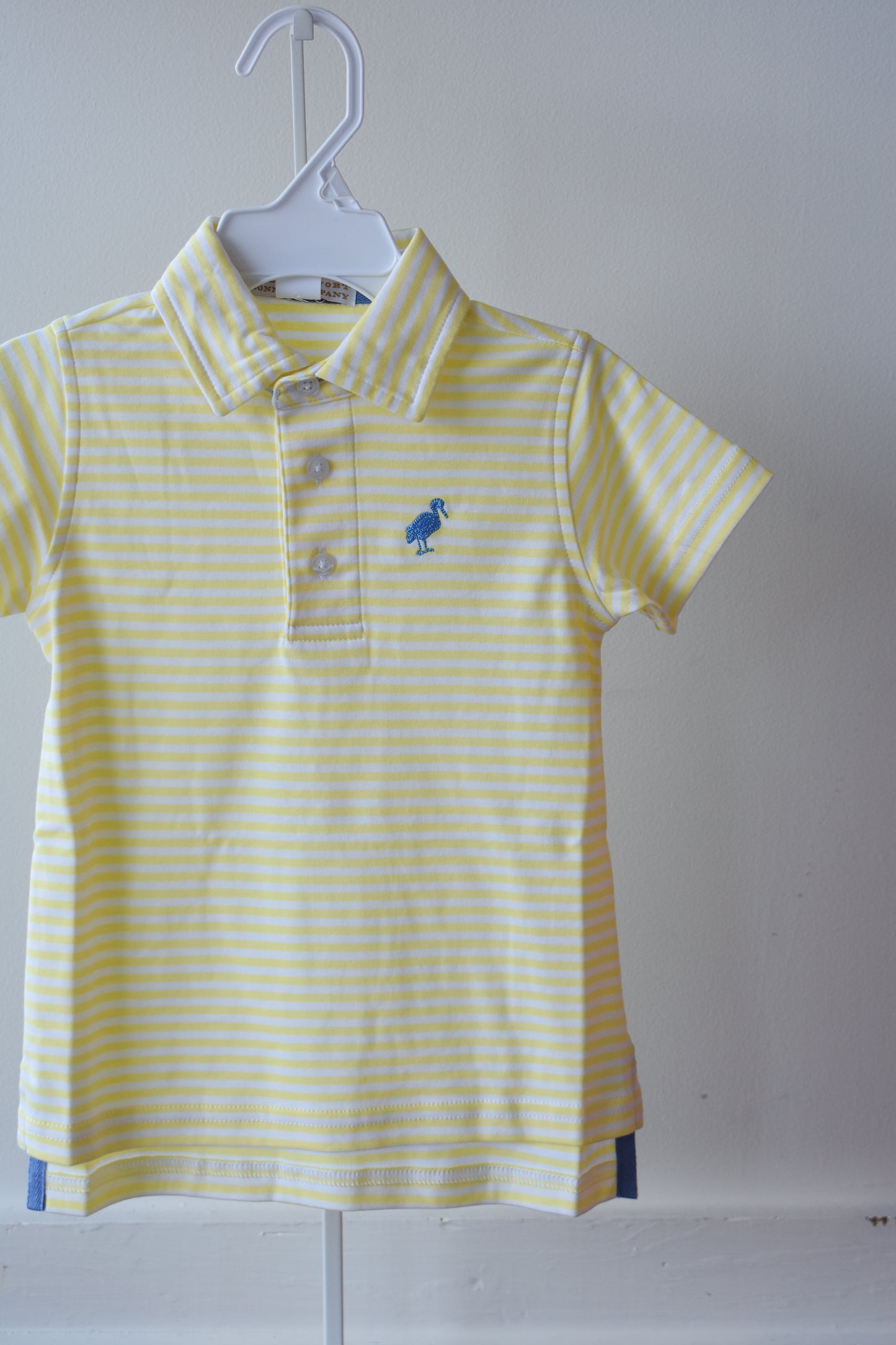Prim & Proper Polo-Lake Worth Yellow Stripe