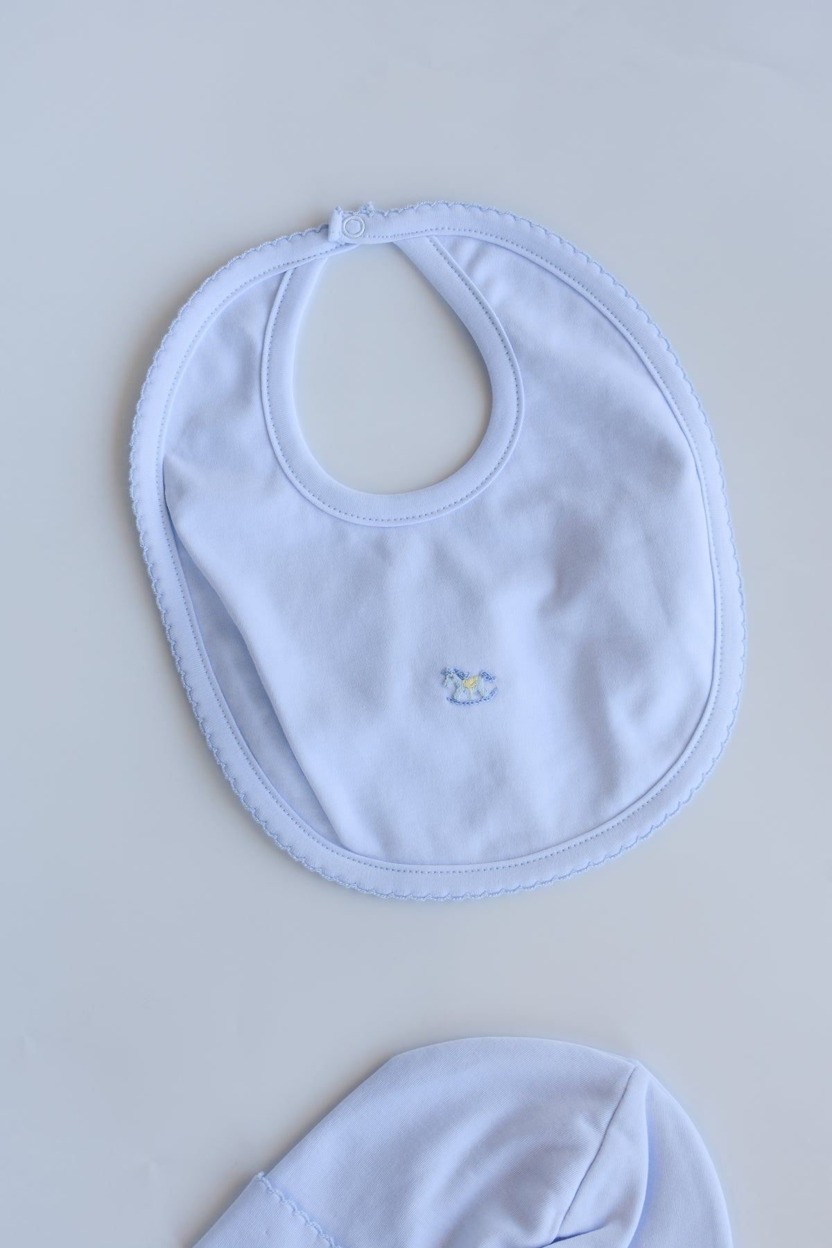 Blue Rockers Embroidered Baby Bib