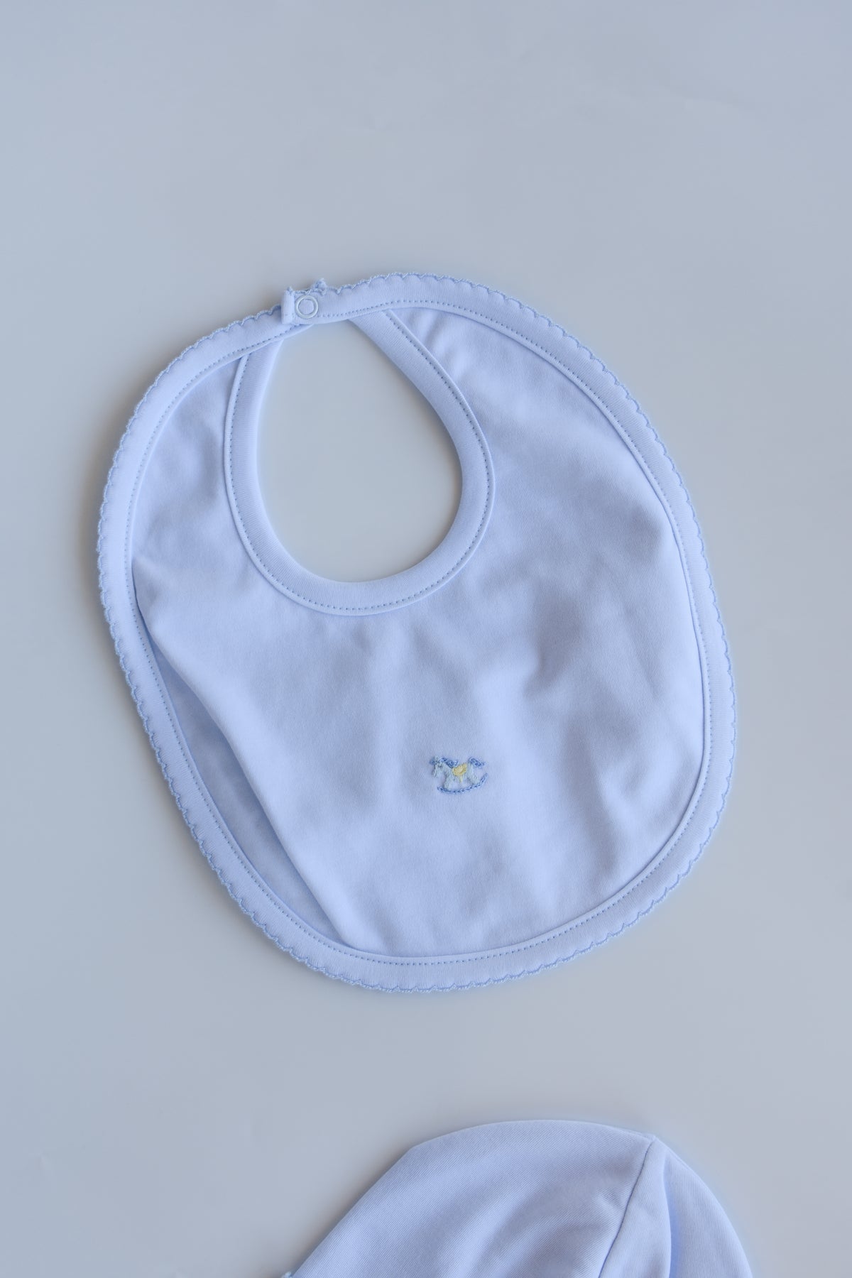 Blue Rockers Embroidered Baby Bib